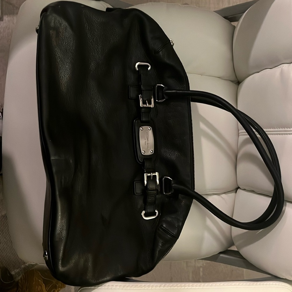 Michael Kors shoulder bag. 18” x 13”. Single compartment